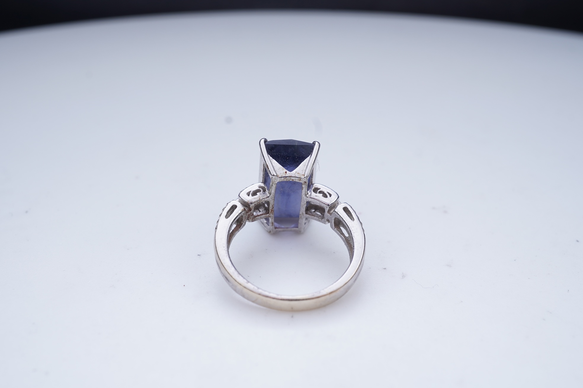 An iolite and diamond ring